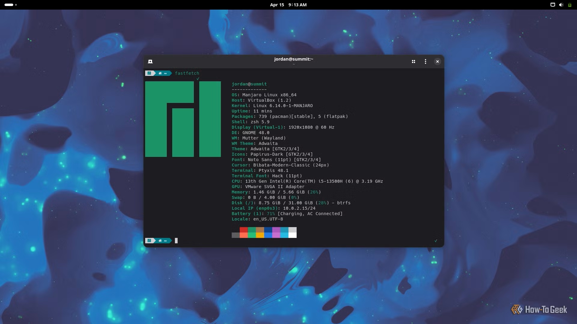 manjaro-summit-desktop-with-a-terminal-open-and-a-fastfetch-output-showing-system-stats.jpg